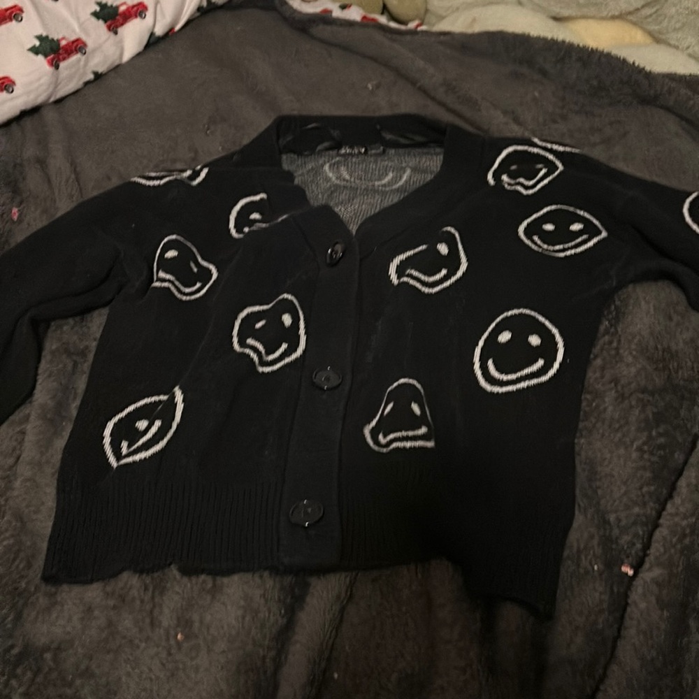 Happy face black jacket